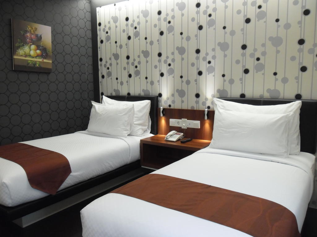 ซิตี้ฮับ โฮเต็ล แอด เกจายาน Hotel ยอกยาการ์ตา ห้อง รูปภาพ
